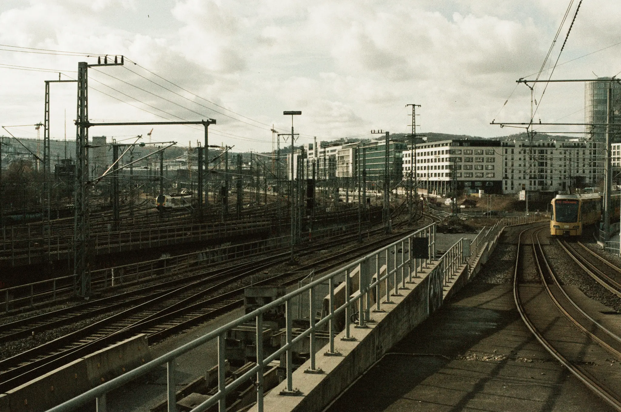 desaturated picture of the railroad tracks leading up to Stuttgart main station